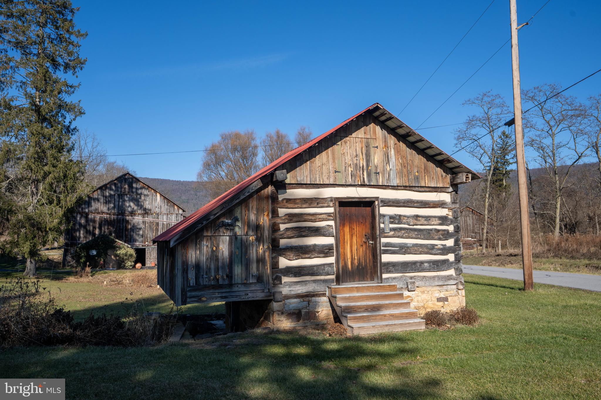 1603 Messiah Church Road Bedford, PA 15522 - Photo 60 of 114 a front view of a house with a yard