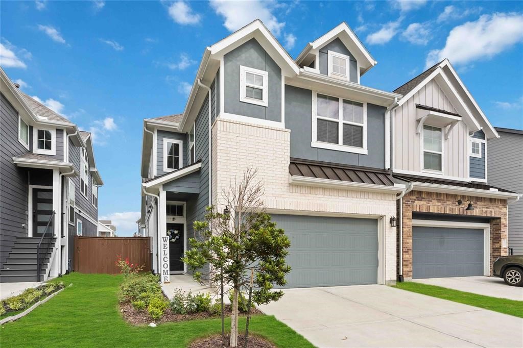 10014 Nectar Path Iowa Colony, TX 77583 - Photo 2 of 26 This modern two-story home features a stylish exterior with a mix of brick and siding, a spacious double garage, and a welcoming front entrance. The well-maintained lawn and landscaping add to its curb appeal.