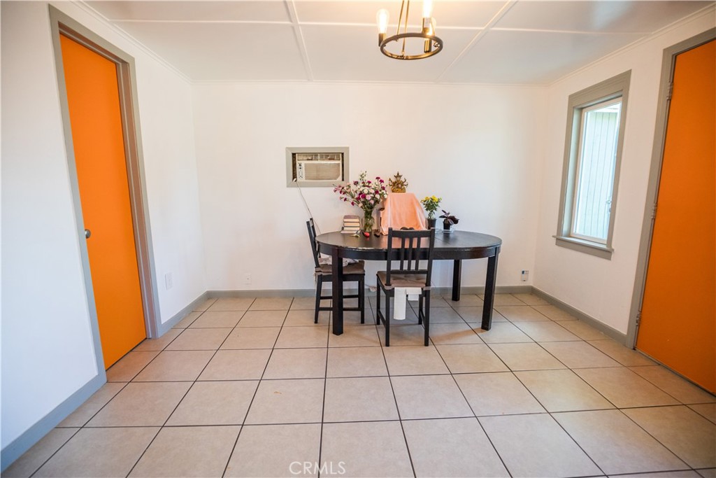 1122 N Street Merced, CA 95341 - Photo 19 of 33 a view of a dining room with furniture and chandelier