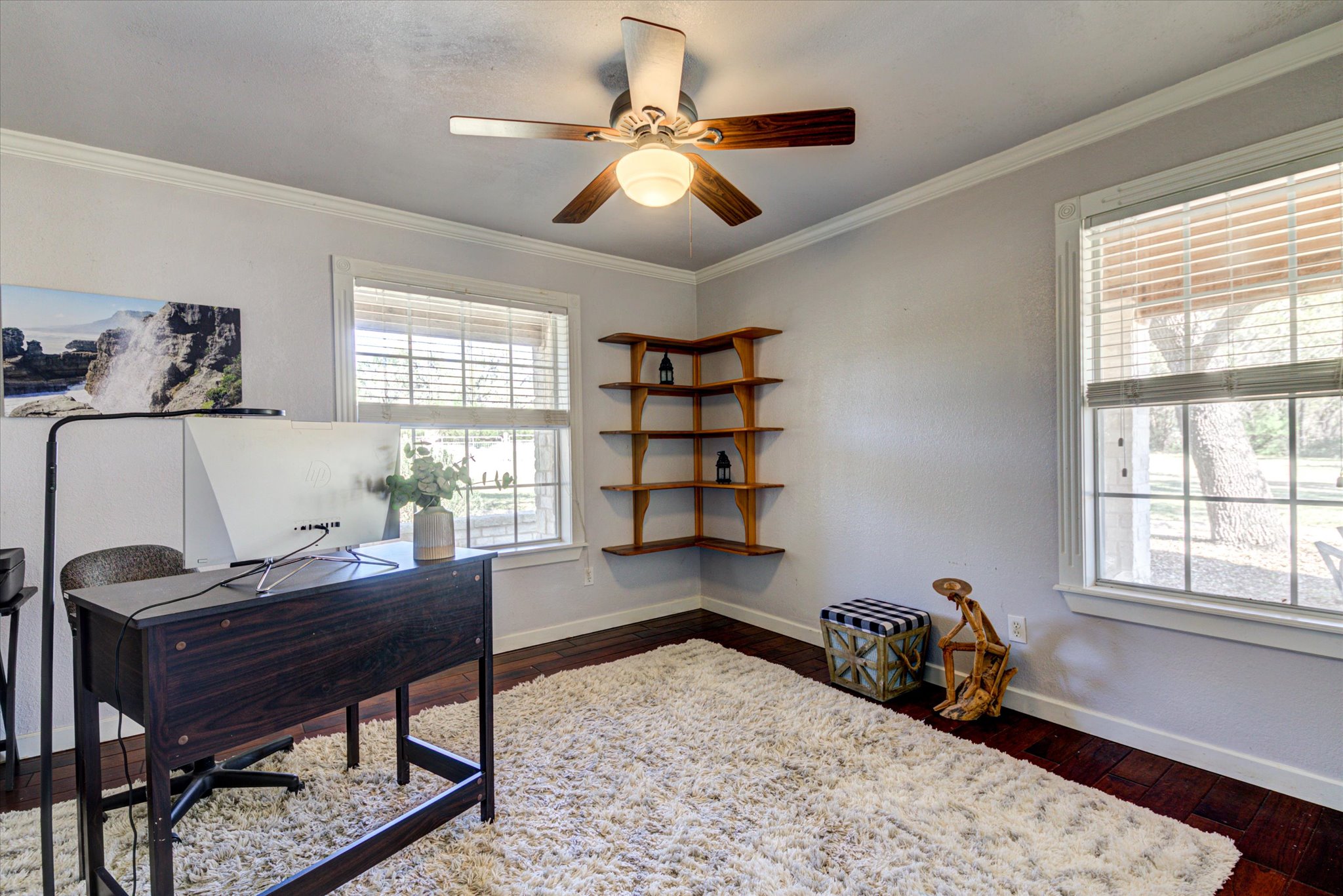 13423 Trail Driver Street Austin, TX 78737 - Photo 17 of 40 a view of a workspace with furniture and a window