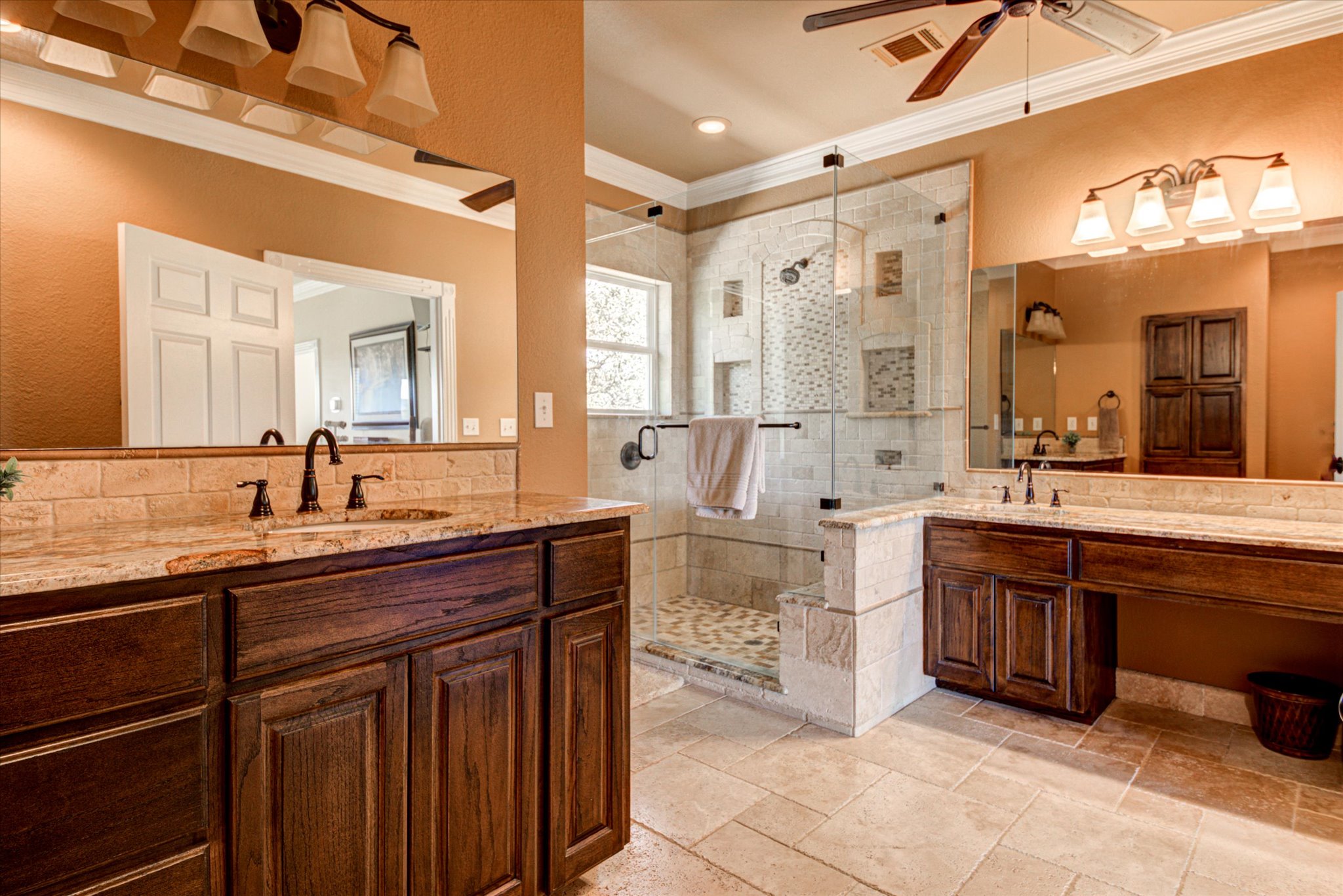 13423 Trail Driver Street Austin, TX 78737 - Photo 26 of 40 a spacious bathroom with a double vanity sink mirror and a bathtub
