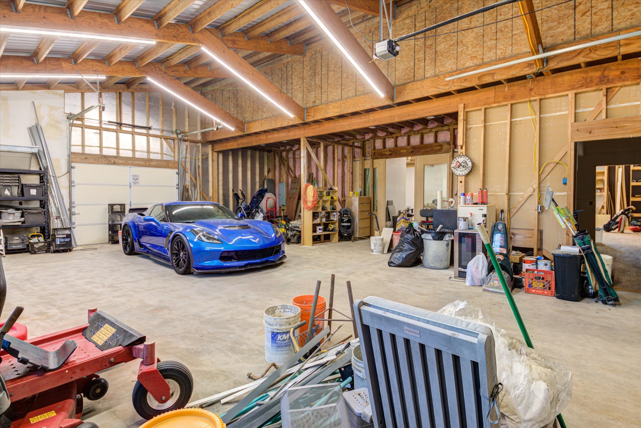 13423 Trail Driver Street Austin, TX 78737 - Photo 36 of 40 a living room with furniture a flat screen tv and a large window