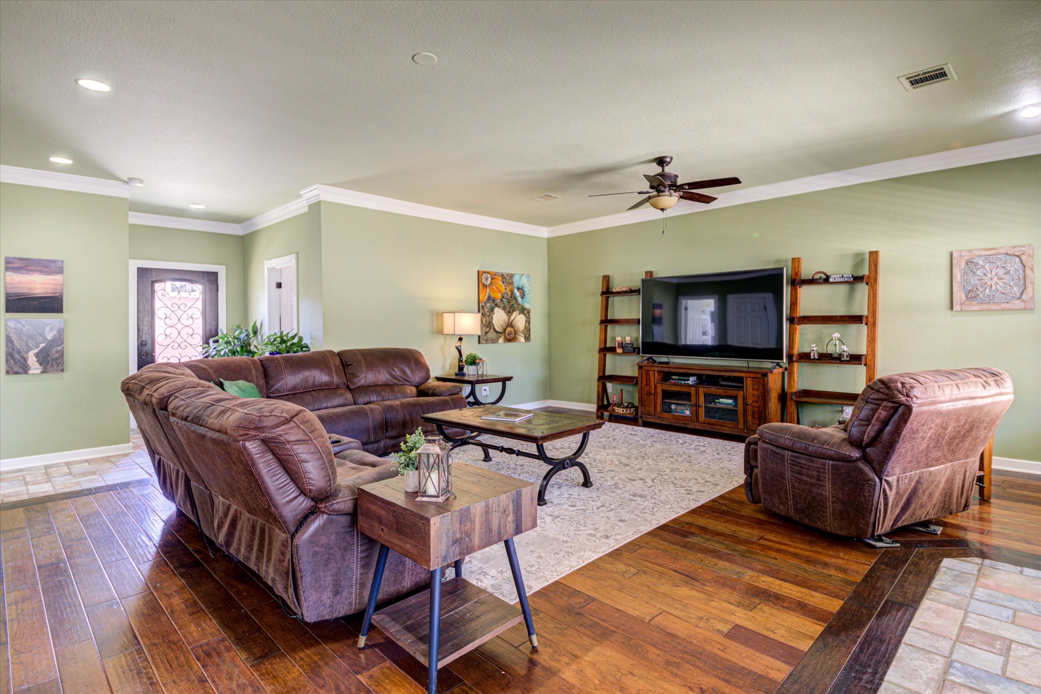 13423 Trail Driver Street Austin, TX 78737 - Photo 7 of 40 a living room with furniture and a flat screen tv