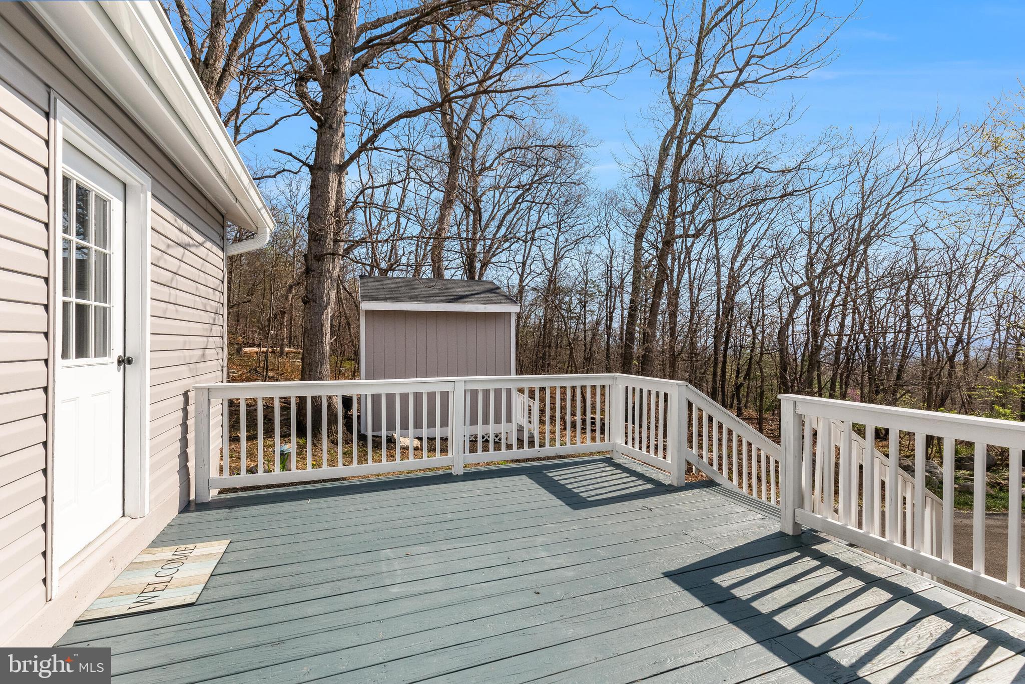 224 Hawk Trail Winchester, VA 22602 - Photo 21 of 29 a view of deck with wooden floor and fence