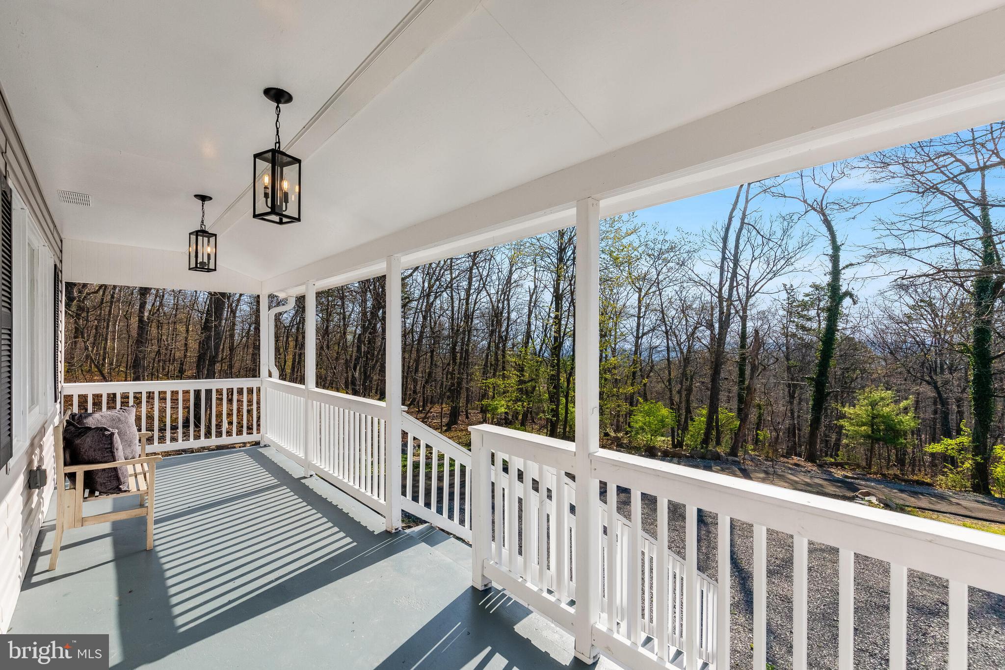 224 Hawk Trail Winchester, VA 22602 - Photo 25 of 29 a view of deck with couches with wooden floor and fence