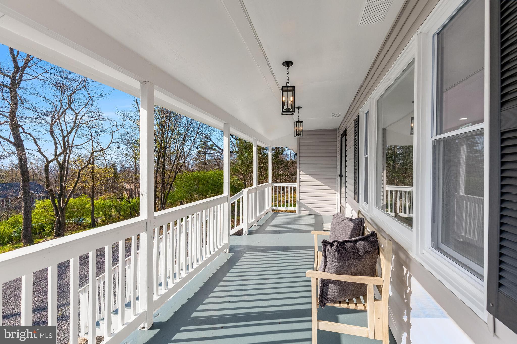 224 Hawk Trail Winchester, VA 22602 - Photo 4 of 29 a view of a porch with wooden floor and outdoor space