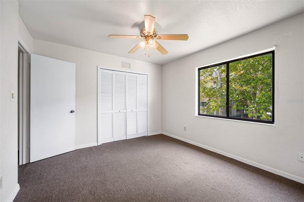 12062 Tift Circle Orlando, FL 32826 - Photo 12 of 26 a view of an empty room with a window