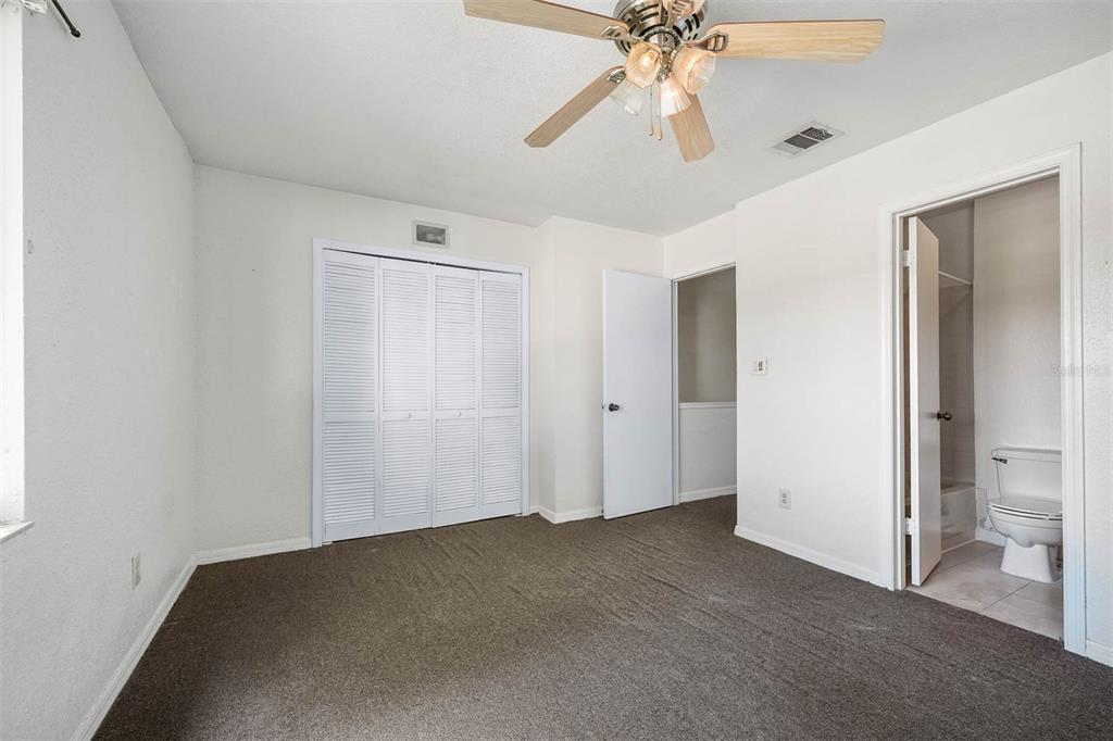 12062 Tift Circle Orlando, FL 32826 - Photo 18 of 26 a view of an empty room and chandelier fan