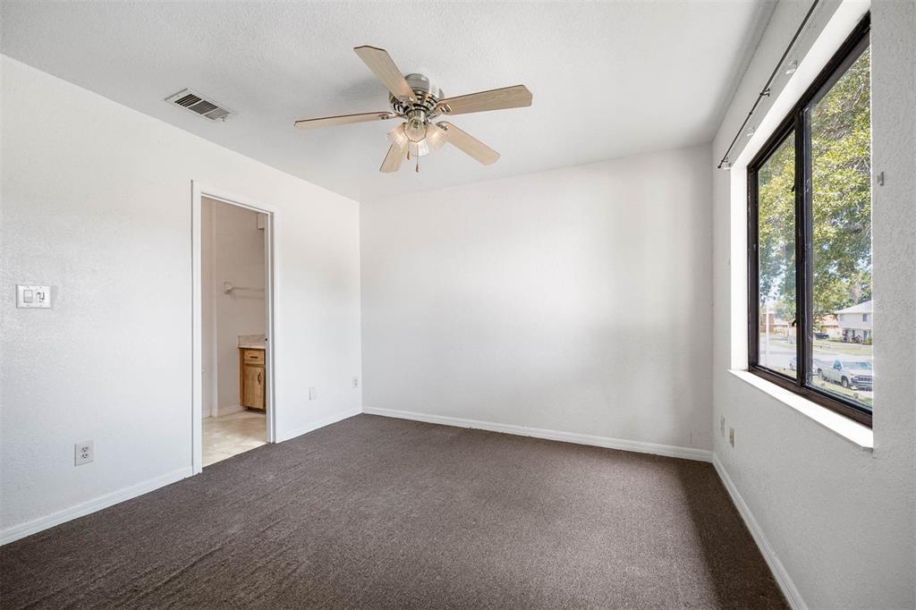 12062 Tift Circle Orlando, FL 32826 - Photo 19 of 26 a view of an empty room with a window
