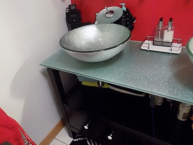 a bathroom with a toilet and a sink