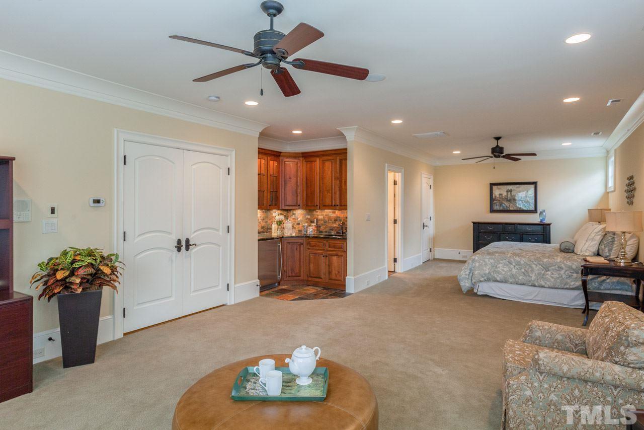 3032 Cone Manor Lane Raleigh, NC 27613 - Photo 19 of 30 a living room with furniture and kitchen view