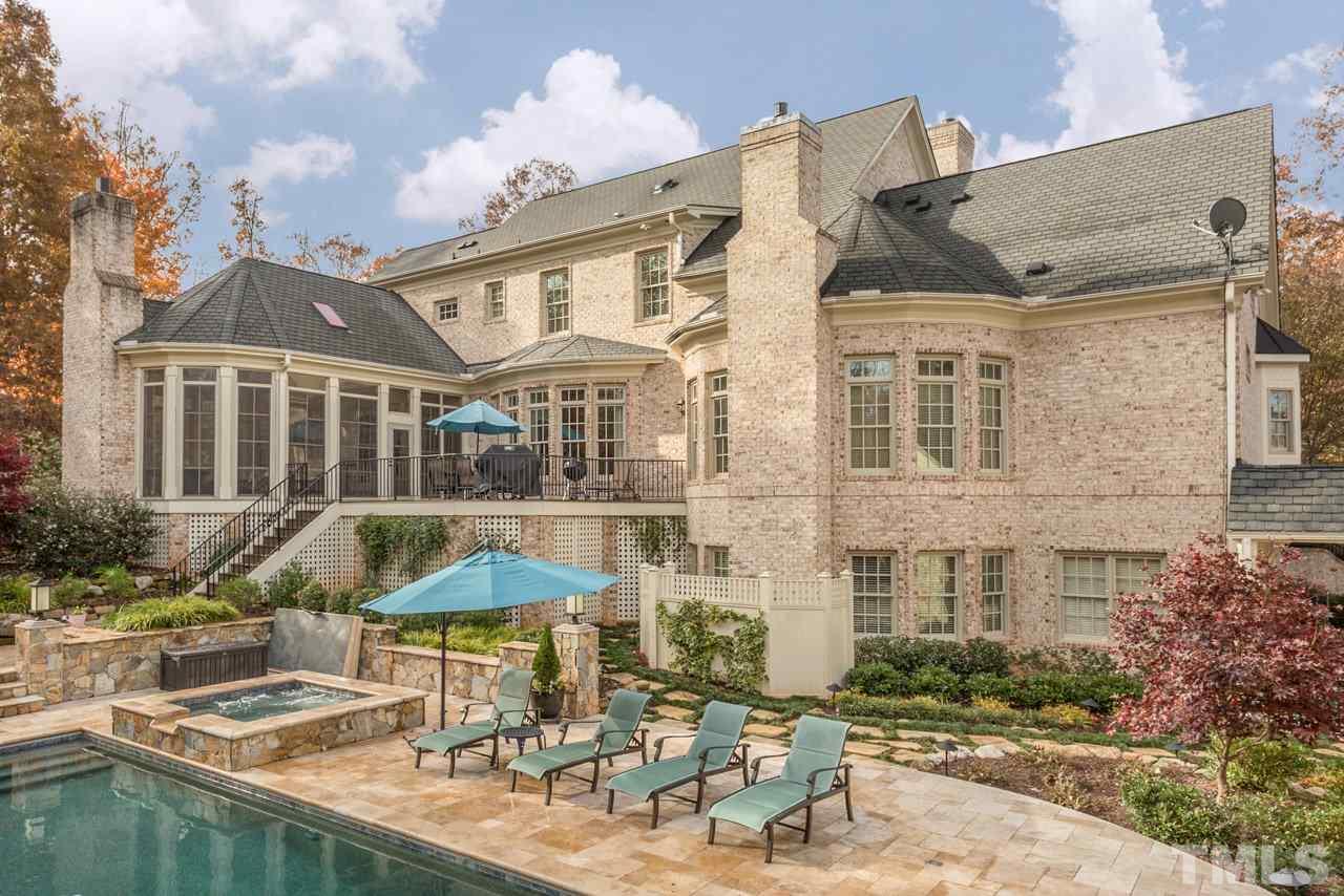 3032 Cone Manor Lane Raleigh, NC 27613 - Photo 3 of 30 a patio with table and chairs