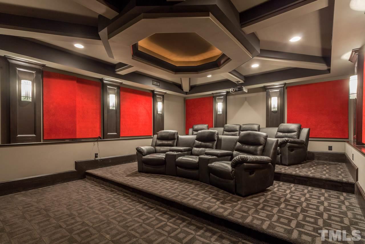 3032 Cone Manor Lane Raleigh, NC 27613 - Photo 24 of 30 a living room with furniture a window and a rug