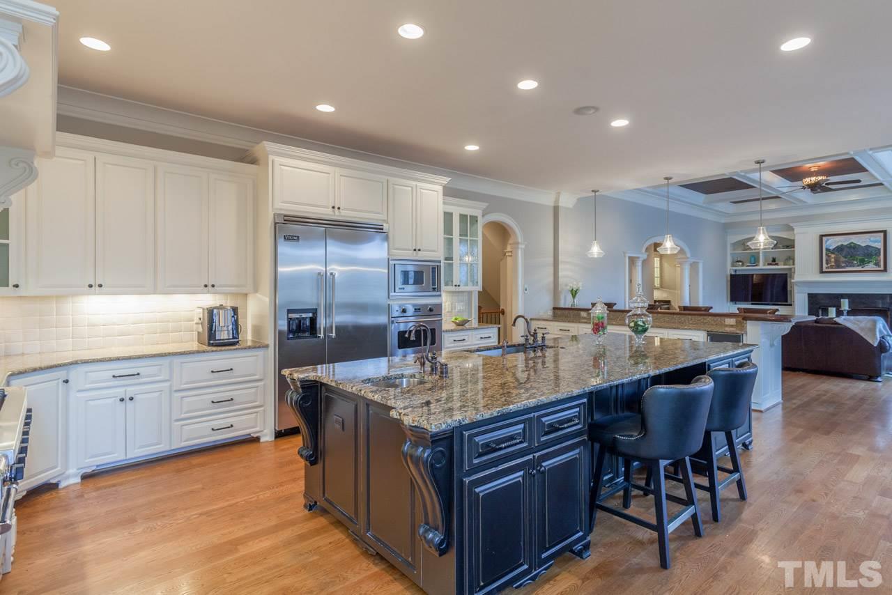 3032 Cone Manor Lane Raleigh, NC 27613 - Photo 9 of 30 a kitchen with sink and cabinets