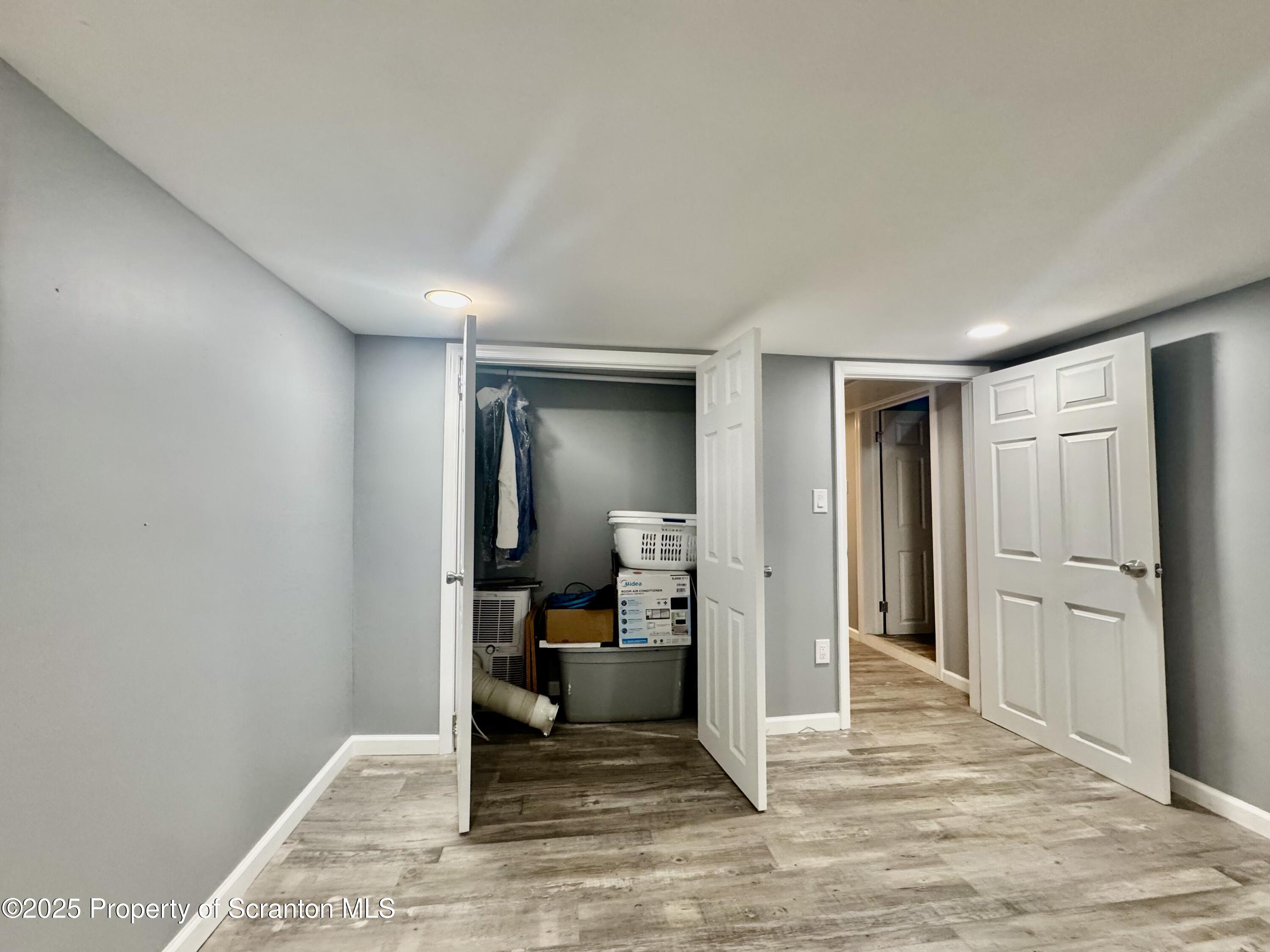 4 Maple Street Pittston, PA 18640 - Photo 17 of 25 a view of a hallway with a livingroom and furniture
