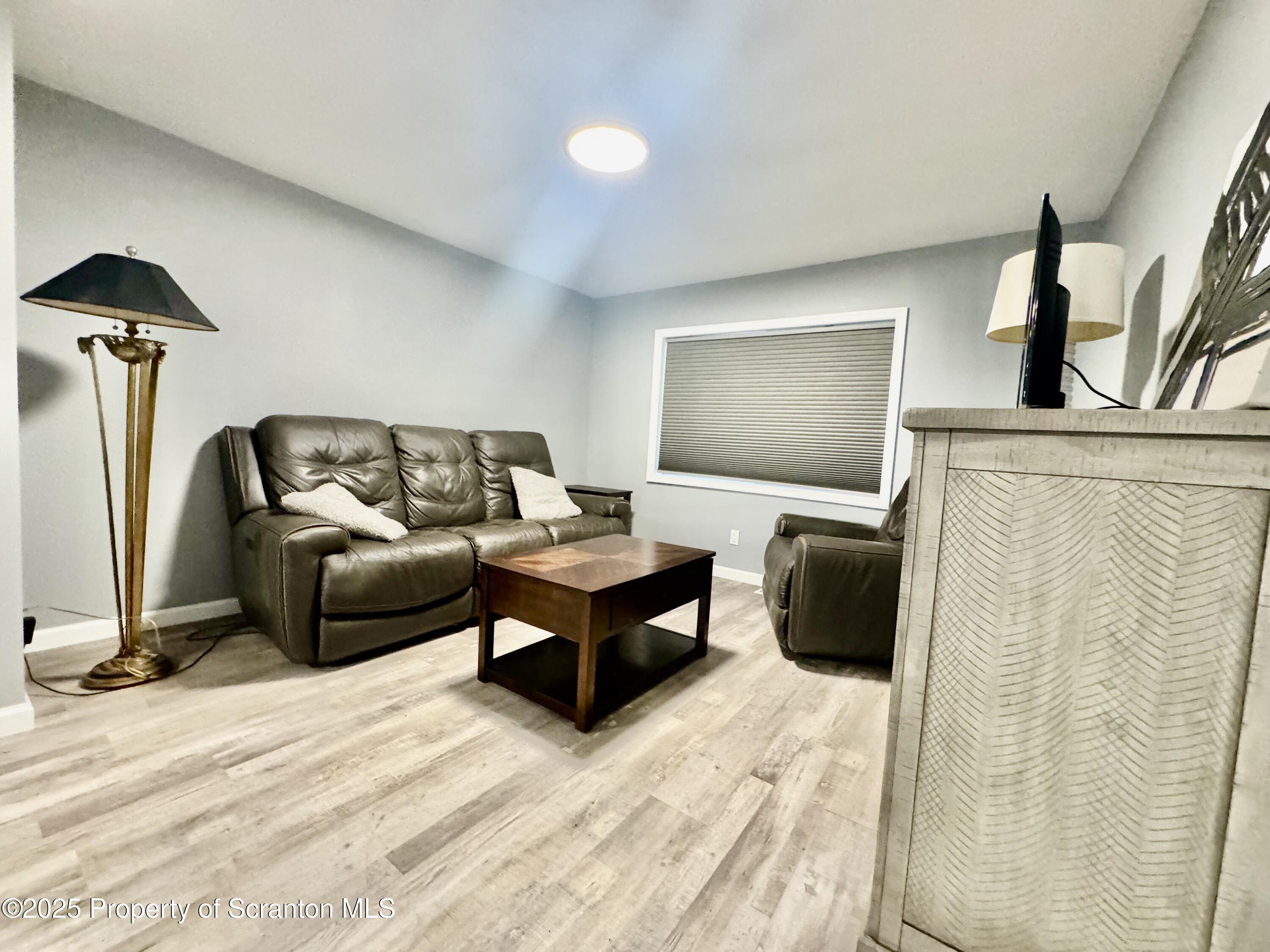 4 Maple Street Pittston, PA 18640 - Photo 5 of 25 a living room with furniture and a couch