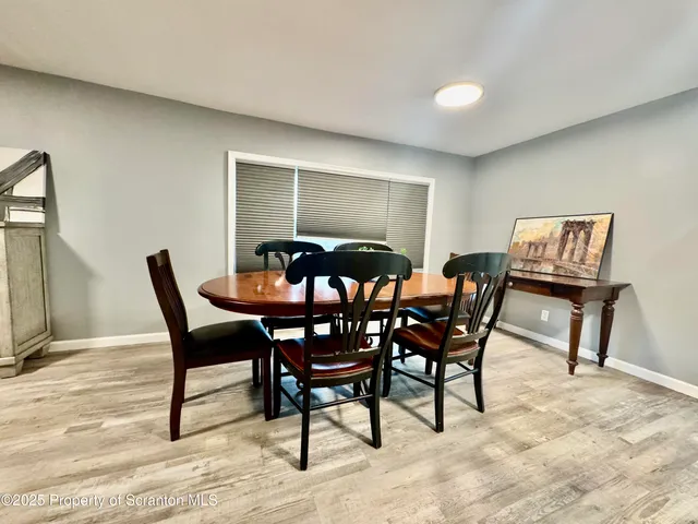 a view of a dining room with furniture
