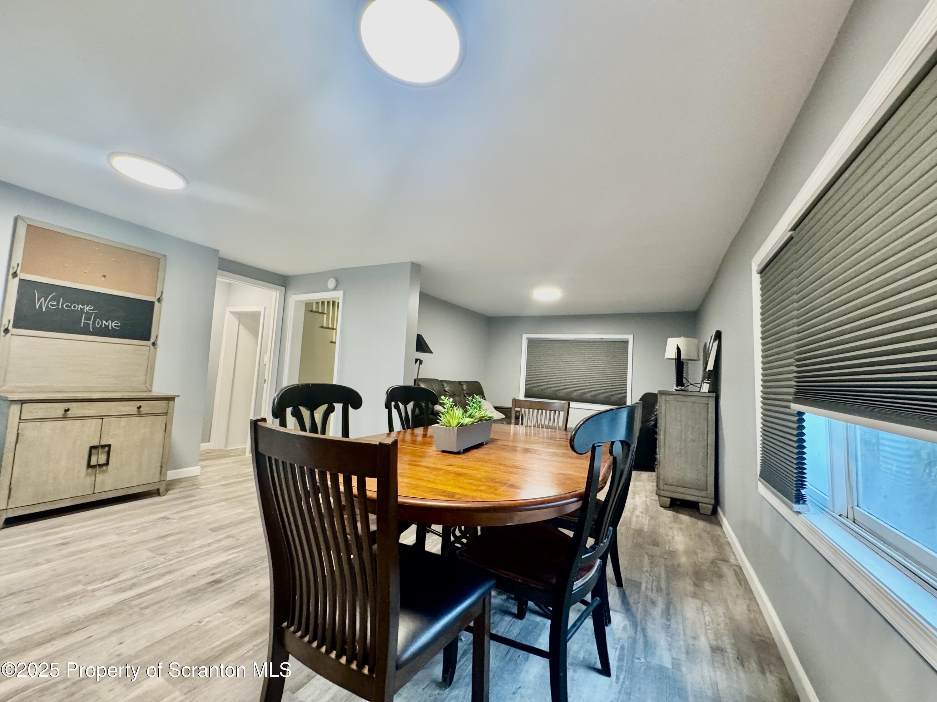 4 Maple Street Pittston, PA 18640 - Photo 8 of 25 a view of a dining room with furniture and a kitchen