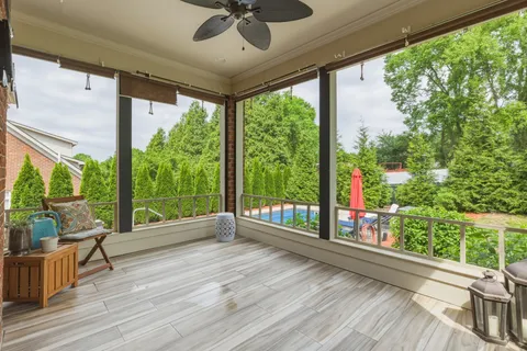 a view of a chairs and table in a yard