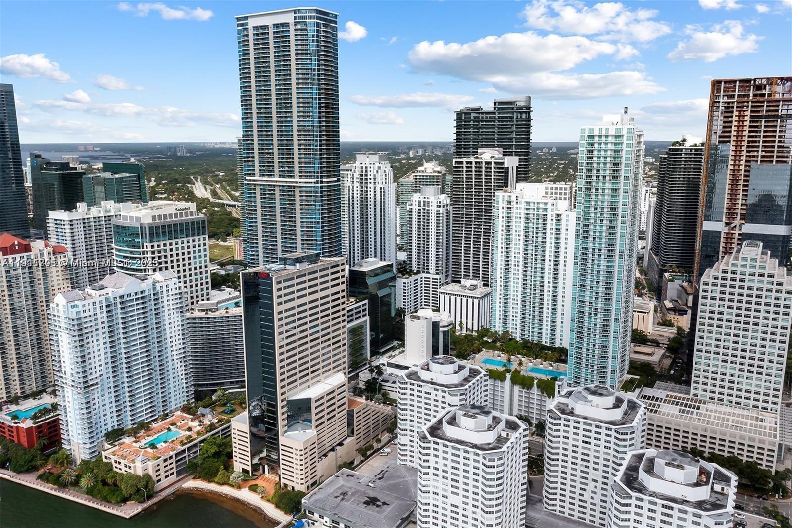951 Brickell Avenue, Unit 2601 Miami, FL 33131 - Photo 16 of 21 a view of city from balcony with outdoor seating