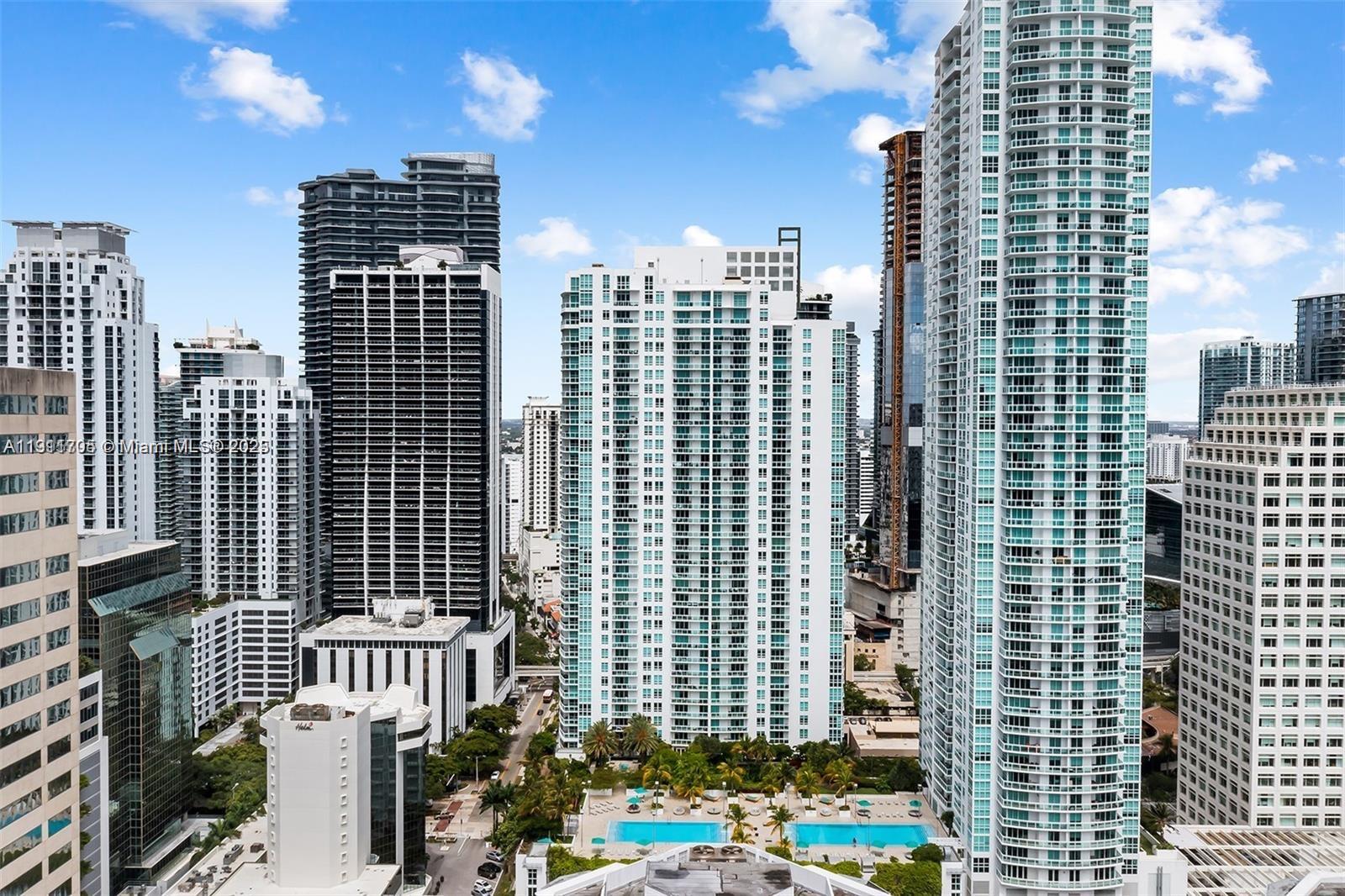 951 Brickell Avenue, Unit 2601 Miami, FL 33131 - Photo 20 of 21 a view of a city with tall buildings