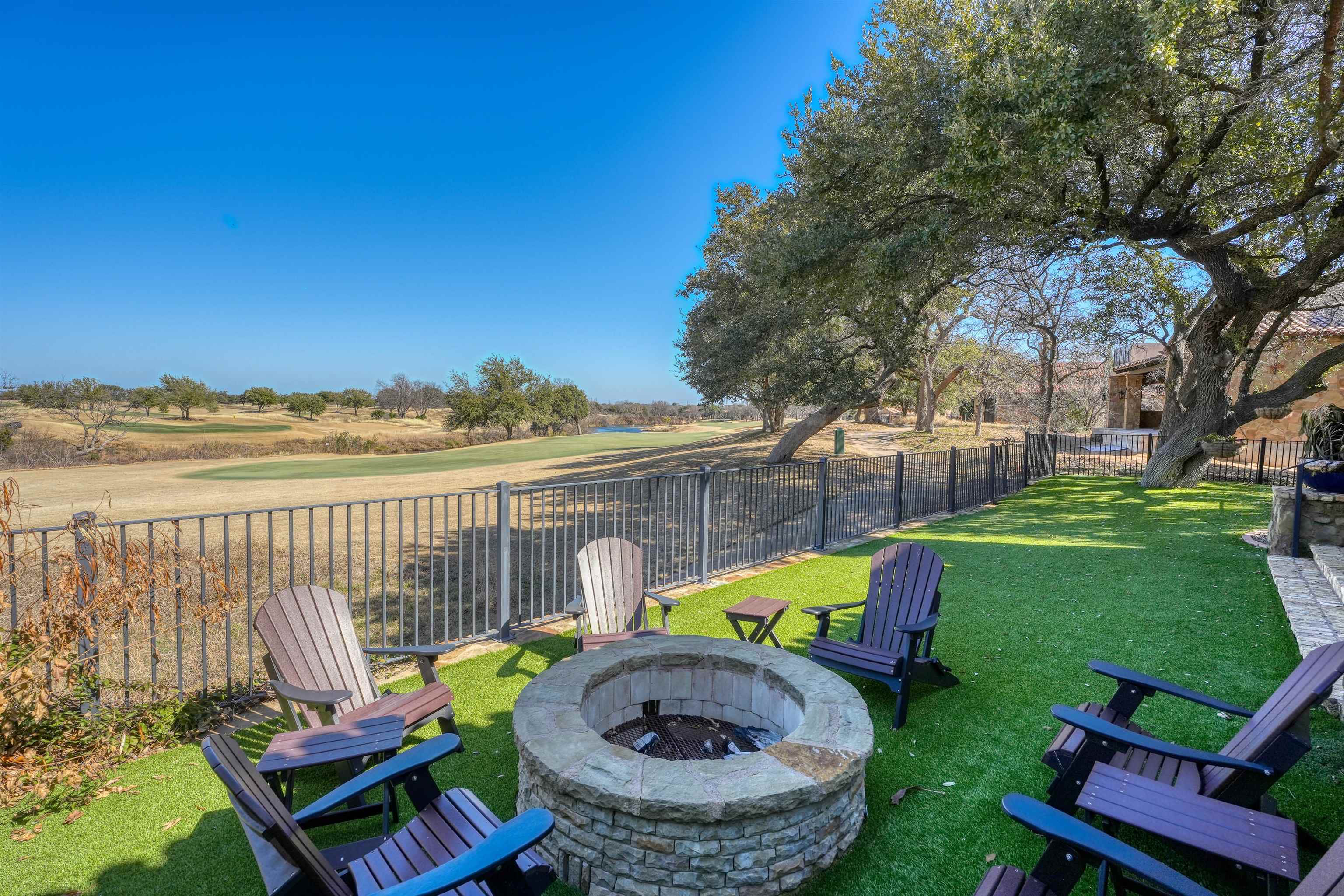 107 Bent Way Road Horseshoe Bay, TX 78657 - Photo 23 of 29 a view of a swimming pool with a patio and a yard