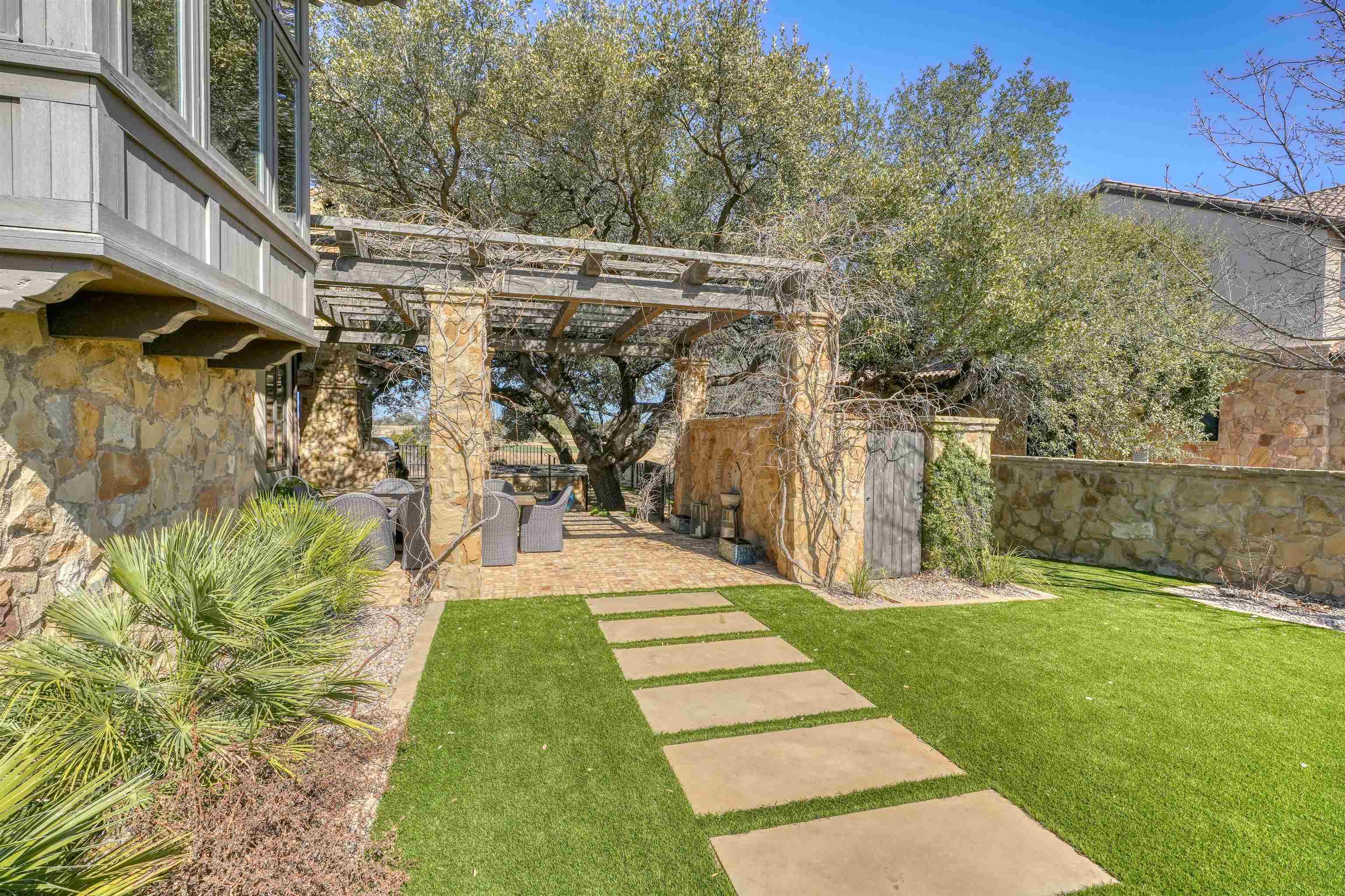 107 Bent Way Road Horseshoe Bay, TX 78657 - Photo 24 of 29 a view of a backyard
