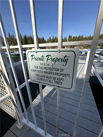 a view of a balcony with wooden floor and outdoor space