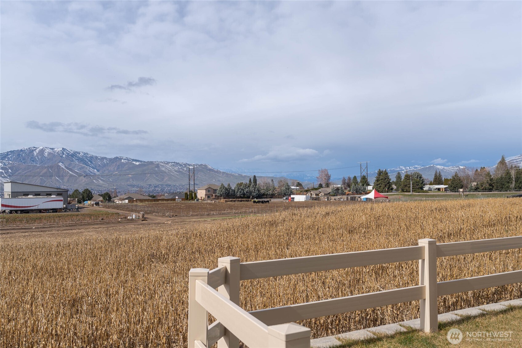 2247 S. Mystical Loop East Wenatchee, WA 98802 - Photo 24 of 25 a view of city and lake with mountain