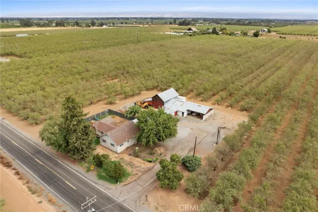 a view of a lake with houses in the back