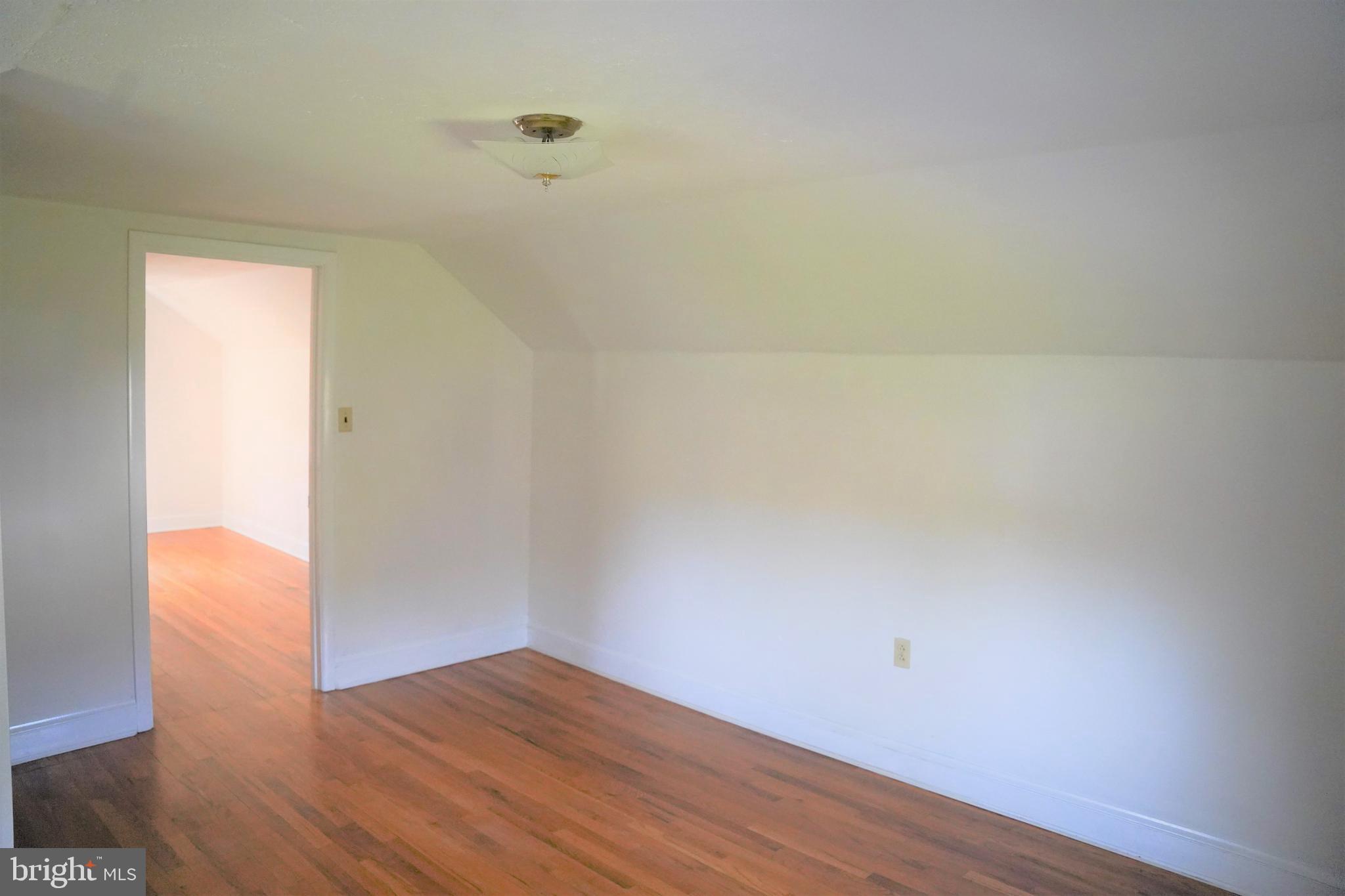 13548 Wilt Store Road Leesburg, VA 20176 - Photo 11 of 23 View of Upstairs Room Showcasing Lovely Floors