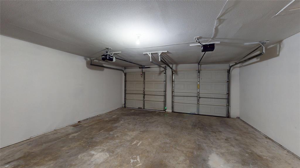 409 Vicki Place Hurst, TX 76053 - Photo 26 of 30 a view of a garage