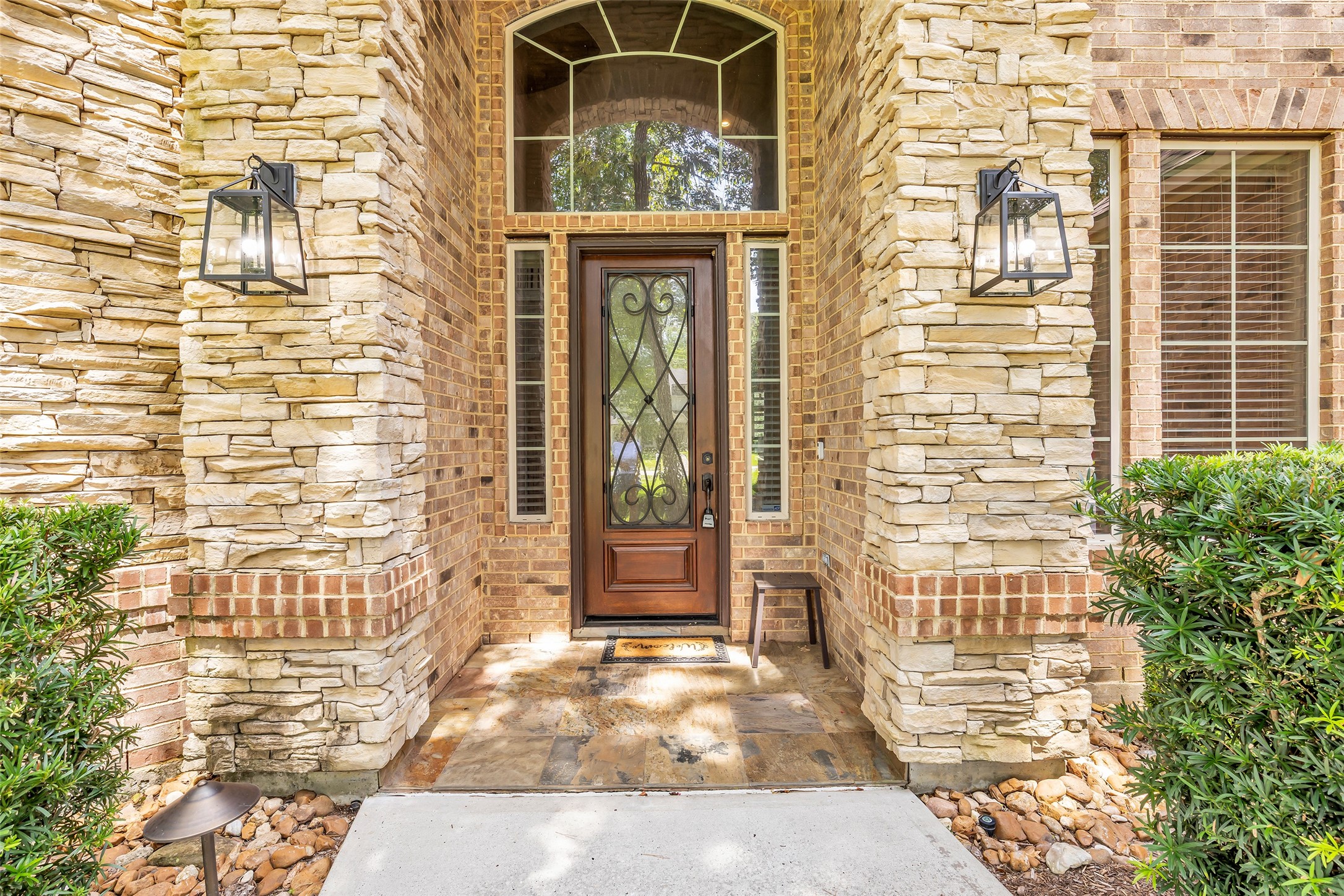 27434 Whispering Maple Way Spring, TX 77386 - Photo 4 of 41 Welcome to your new home. Taller 7' door and two story covered exterior entry.