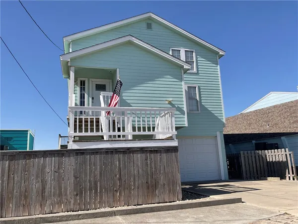 a front view of a house with a balcony