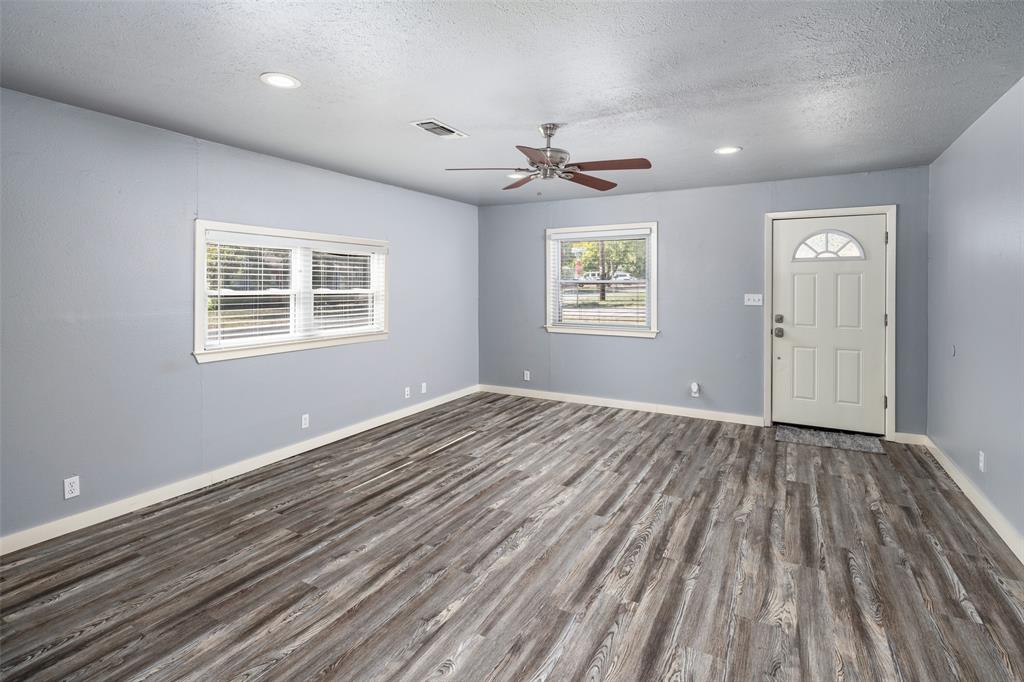 400 Denton Street Howe, TX 75459 - Photo 5 of 34 Laminate floor through out the home.