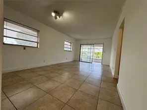 a view of an empty room and window