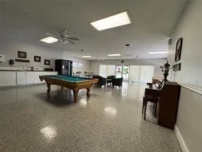 a lobby with furniture and a view of living room