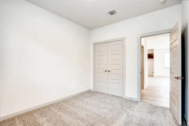 an empty room with closet