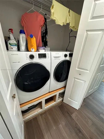 a utility room with dryer and washer