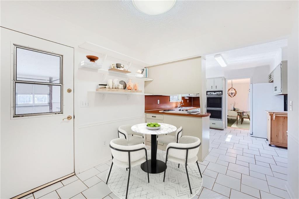 4759 Mockernut Southwest Lilburn, GA 30047 - Photo 7 of 21