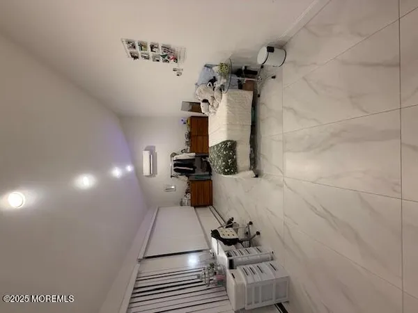 a bathroom with a sink and a shower