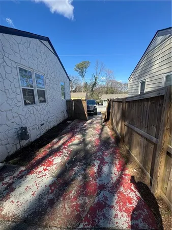 a view of a backyard with a patio
