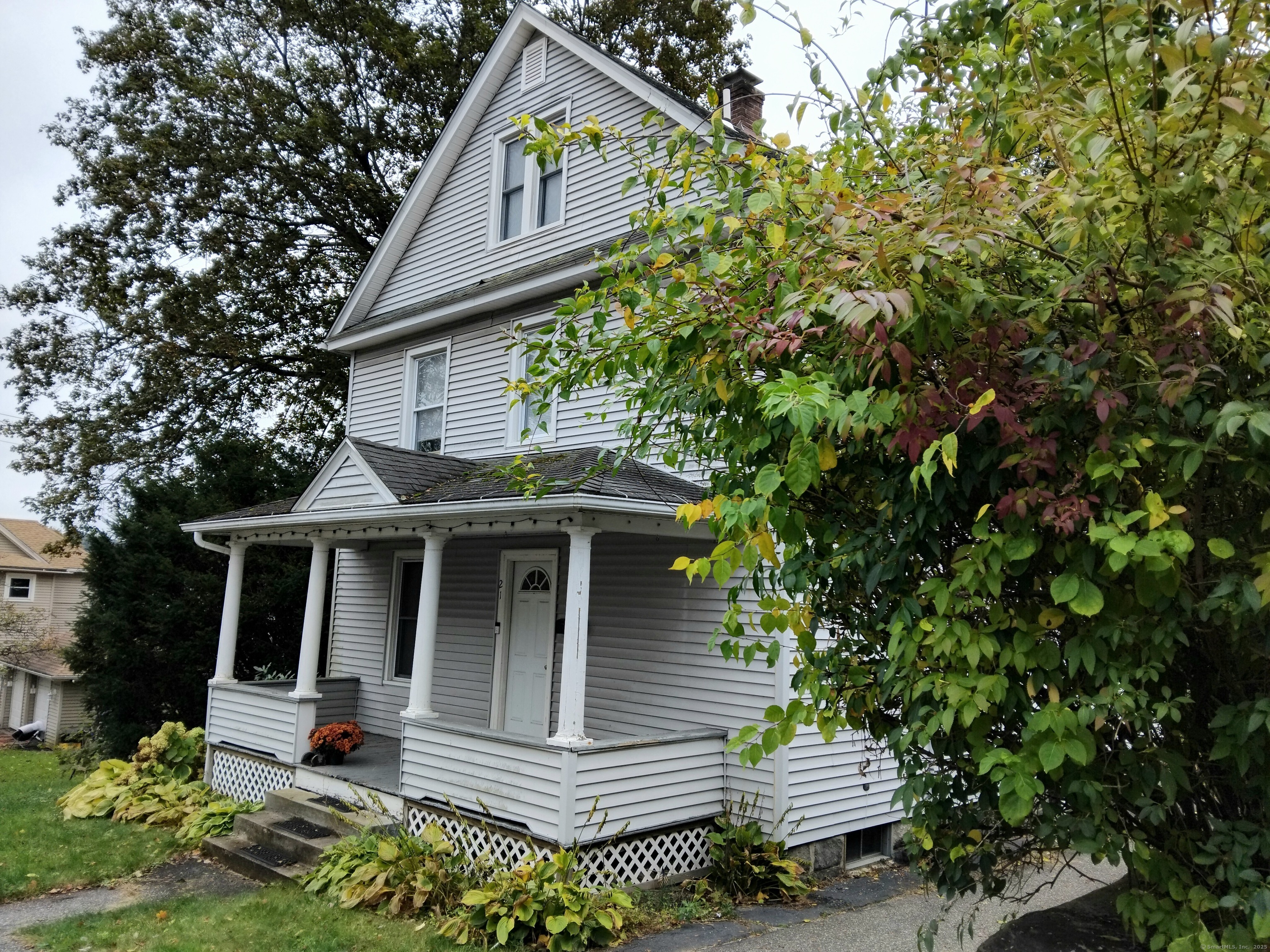 21 Roosevelt Avenue Torrington, CT 06790 - Photo 1 of 22 a view of a house with a yard