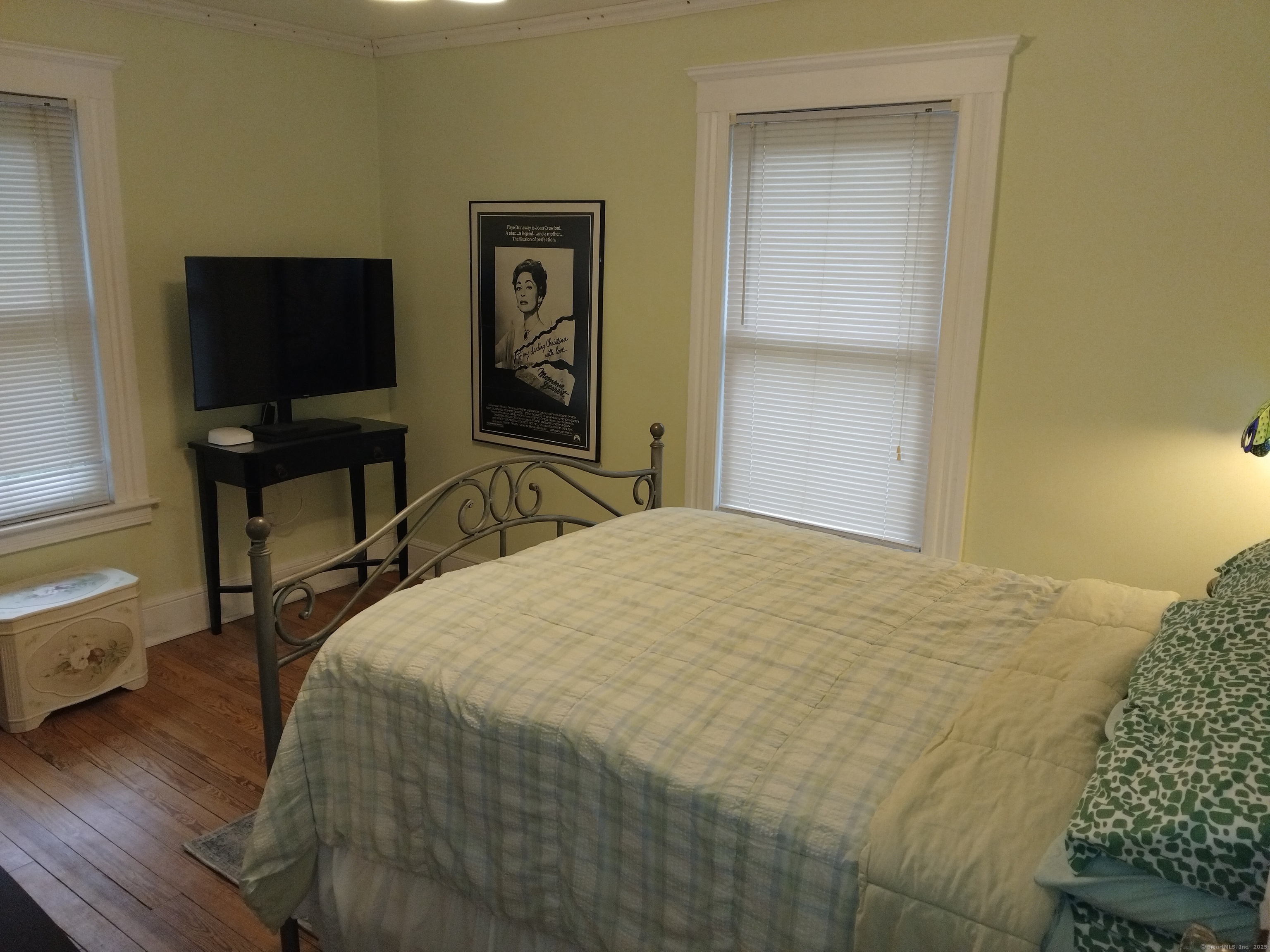 21 Roosevelt Avenue Torrington, CT 06790 - Photo 12 of 22 a bedroom with a bed and a flat screen tv