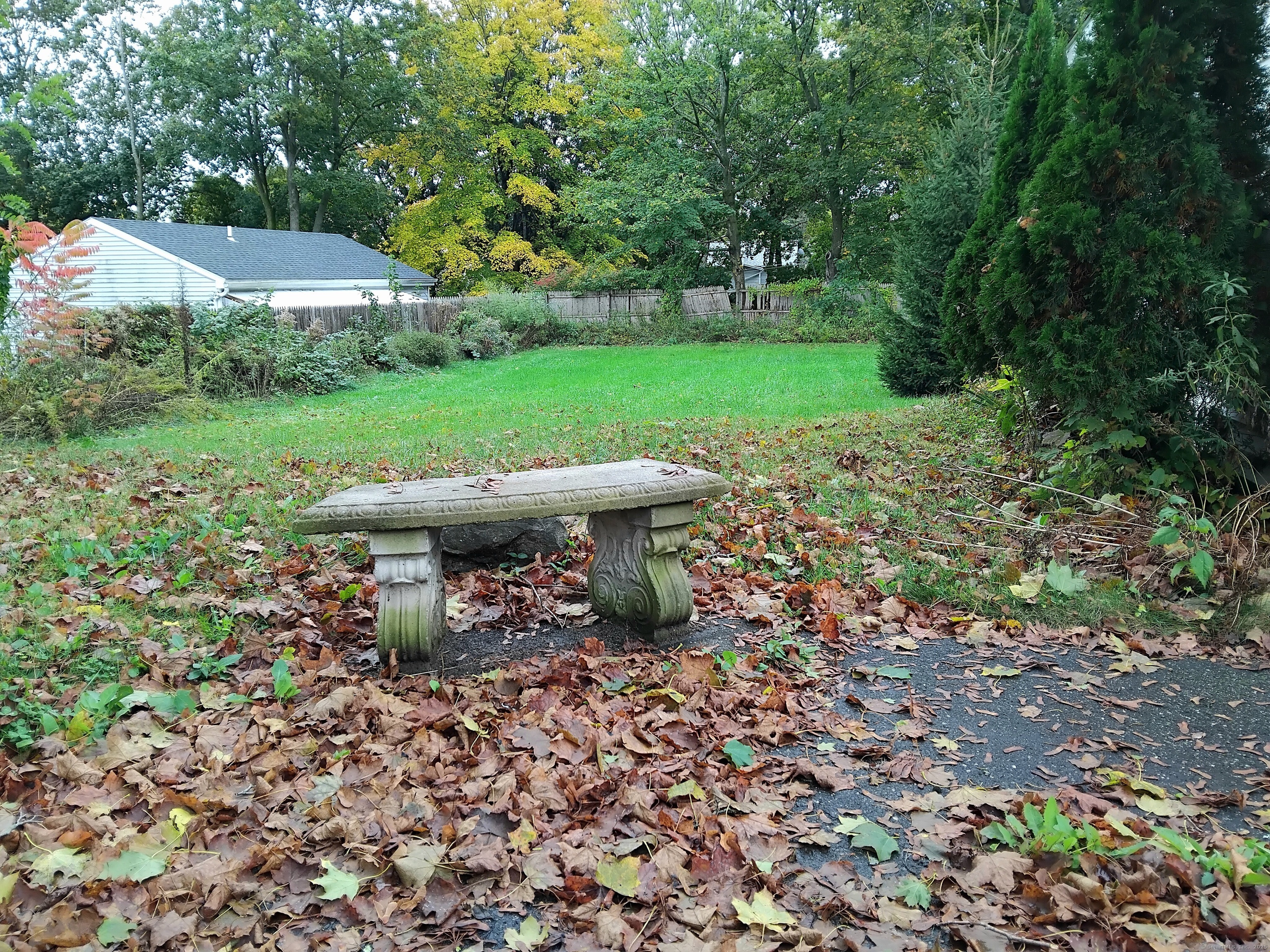 21 Roosevelt Avenue Torrington, CT 06790 - Photo 22 of 22 a view of a table and chairs in backyard