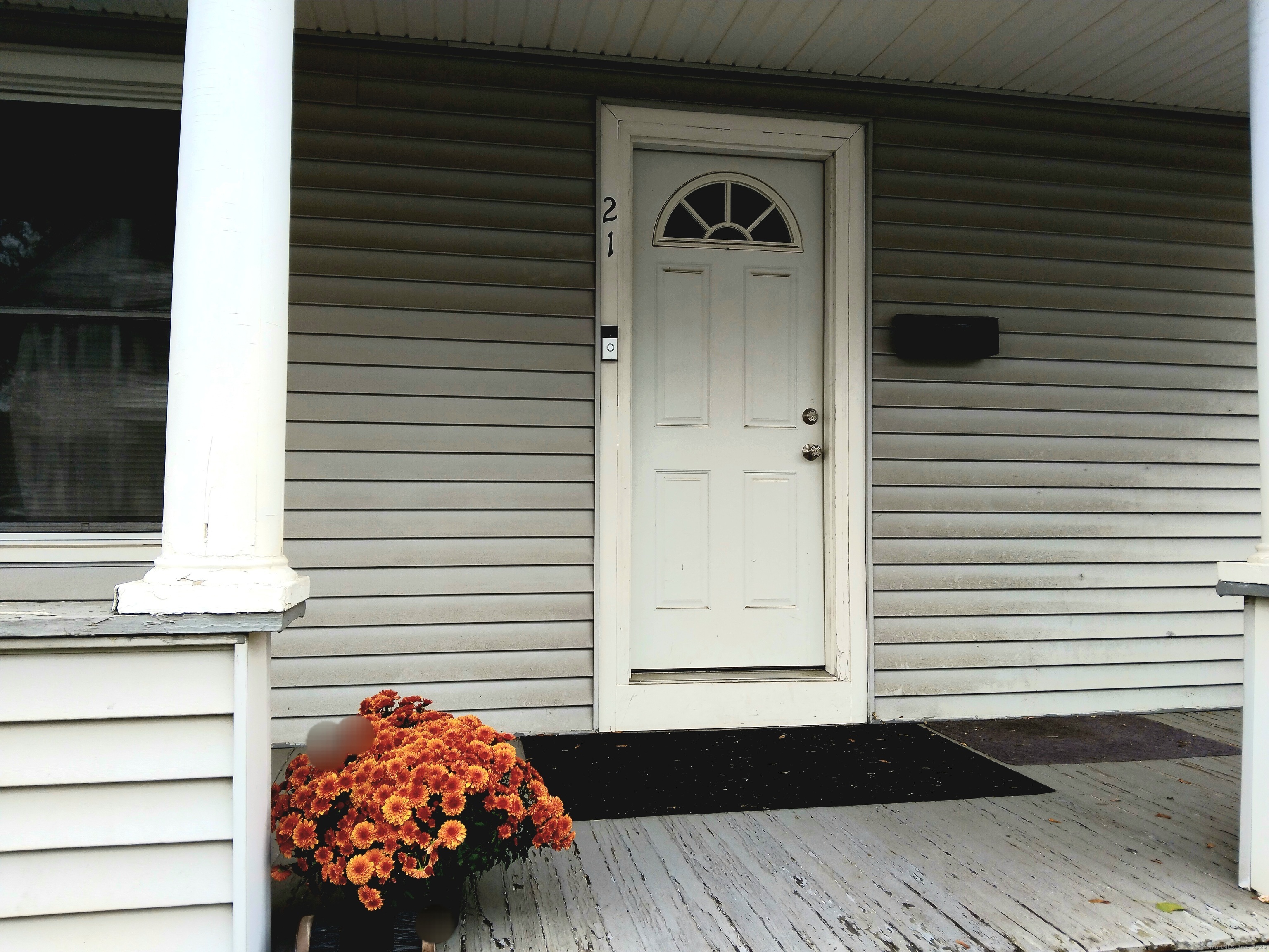 21 Roosevelt Avenue Torrington, CT 06790 - Photo 3 of 22 a view of a entryway door of the house