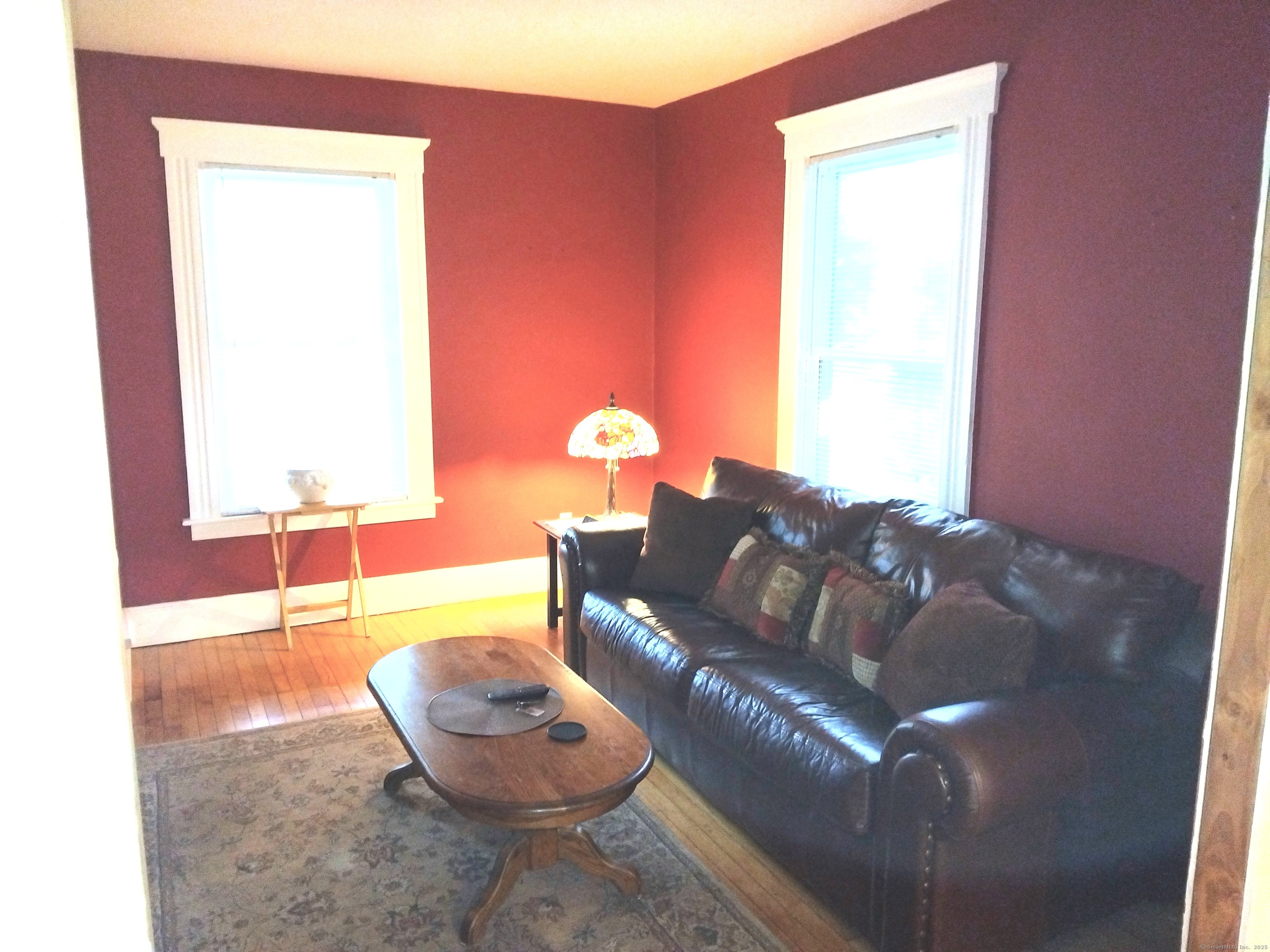 21 Roosevelt Avenue Torrington, CT 06790 - Photo 4 of 22 a living room with furniture and a window