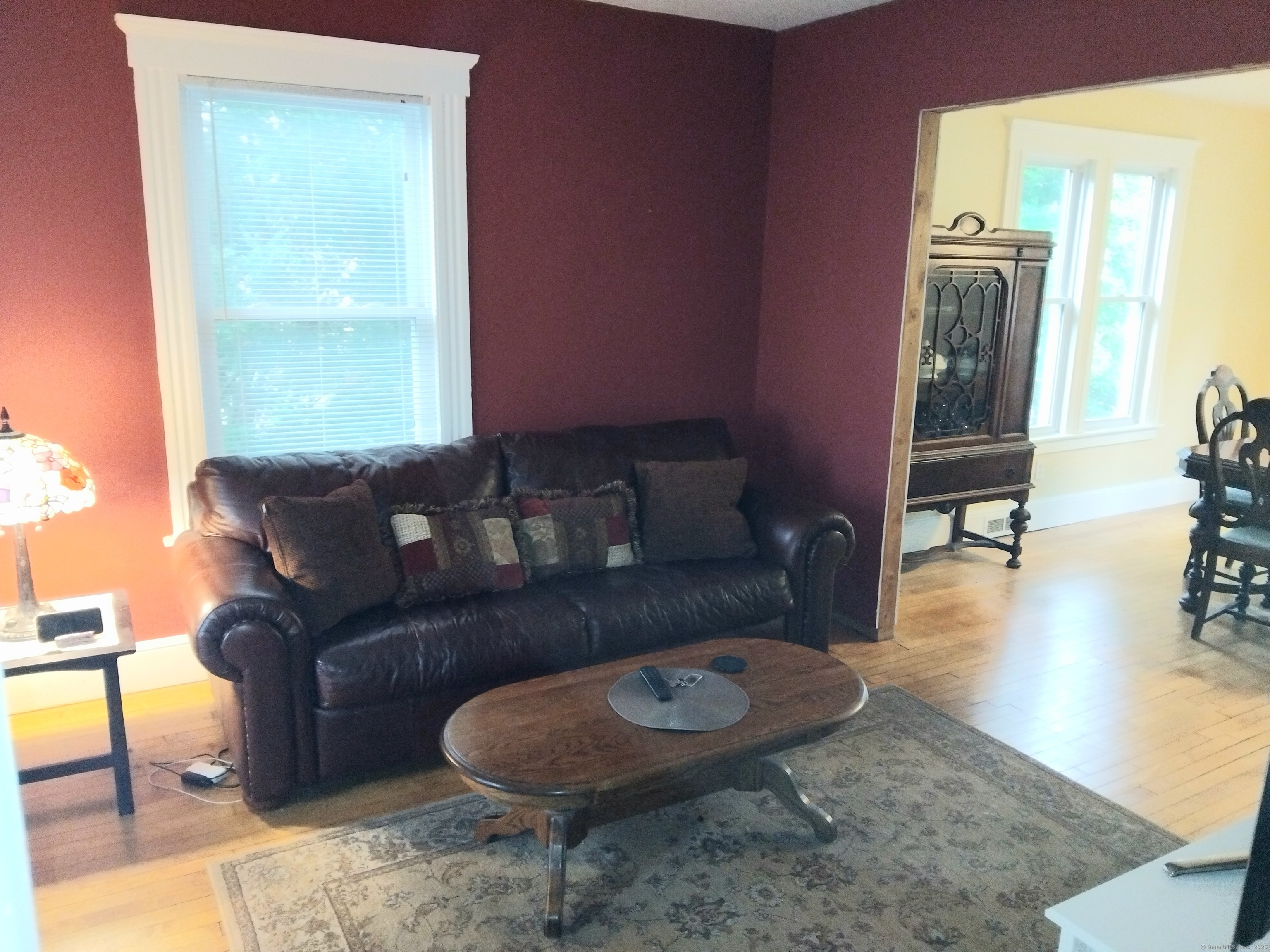 21 Roosevelt Avenue Torrington, CT 06790 - Photo 5 of 22 a living room with furniture and a rug