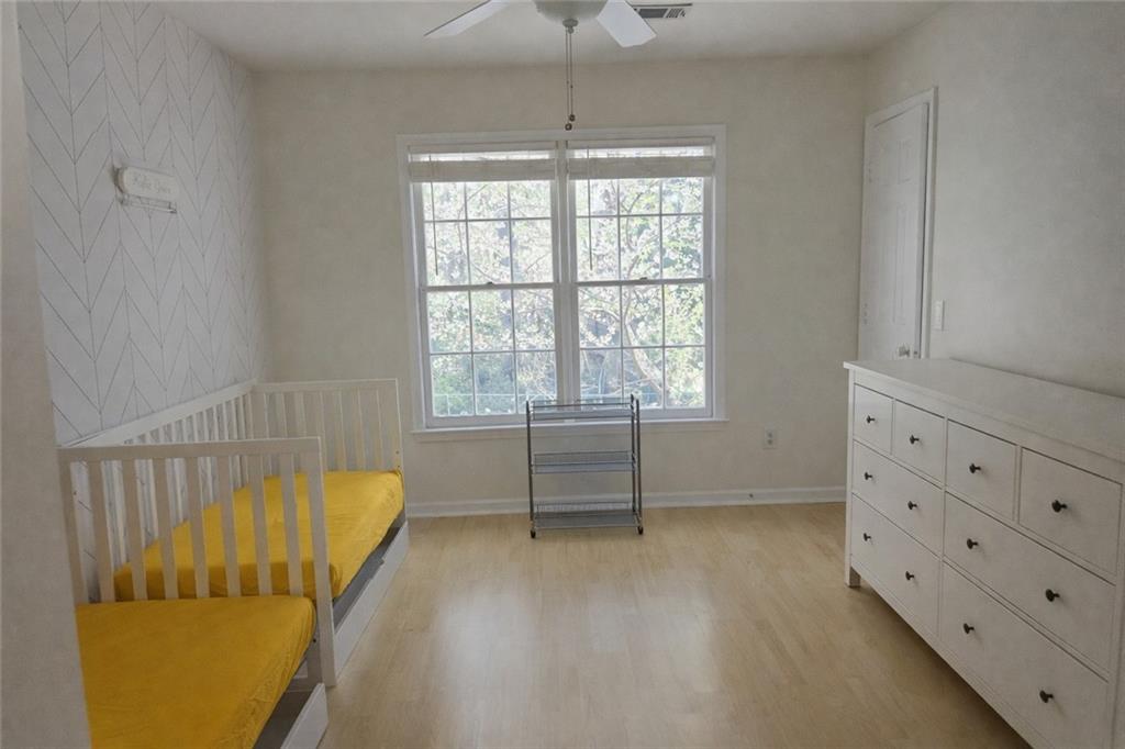 1209 Wildcliff Circle, Unit 100 Atlanta, GA 30329 - Photo 13 of 21 a view of an empty room with a window