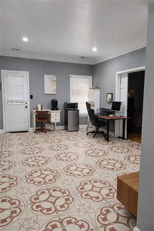 a living room with furniture window and a table